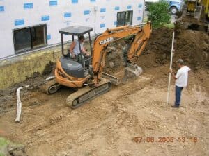 Small excavator digging