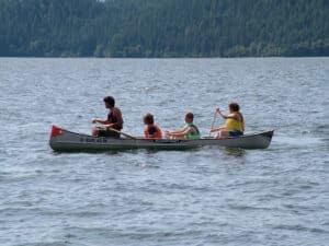 Four boys in a canoe